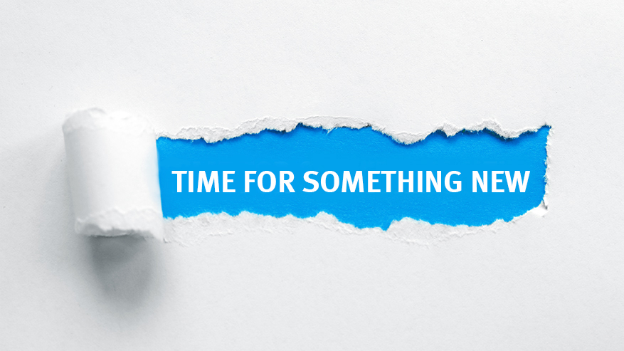 Aus einer weißen Fläche ist ein Stück herausgerissen. Dadurch wird eine blaue Fläche sichtbar auf der in weißer Schrift "Time for something new" steht